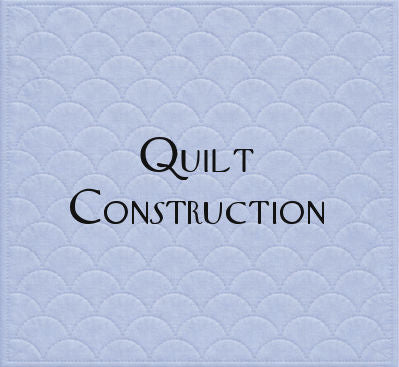 tools such as adhesives used in quilt construction